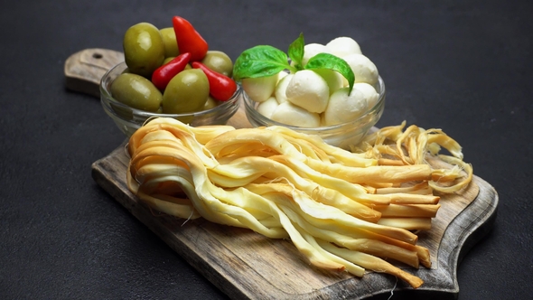 Video of Smoked Braided Cheese, Mozzarella and Olives by repinanatoly