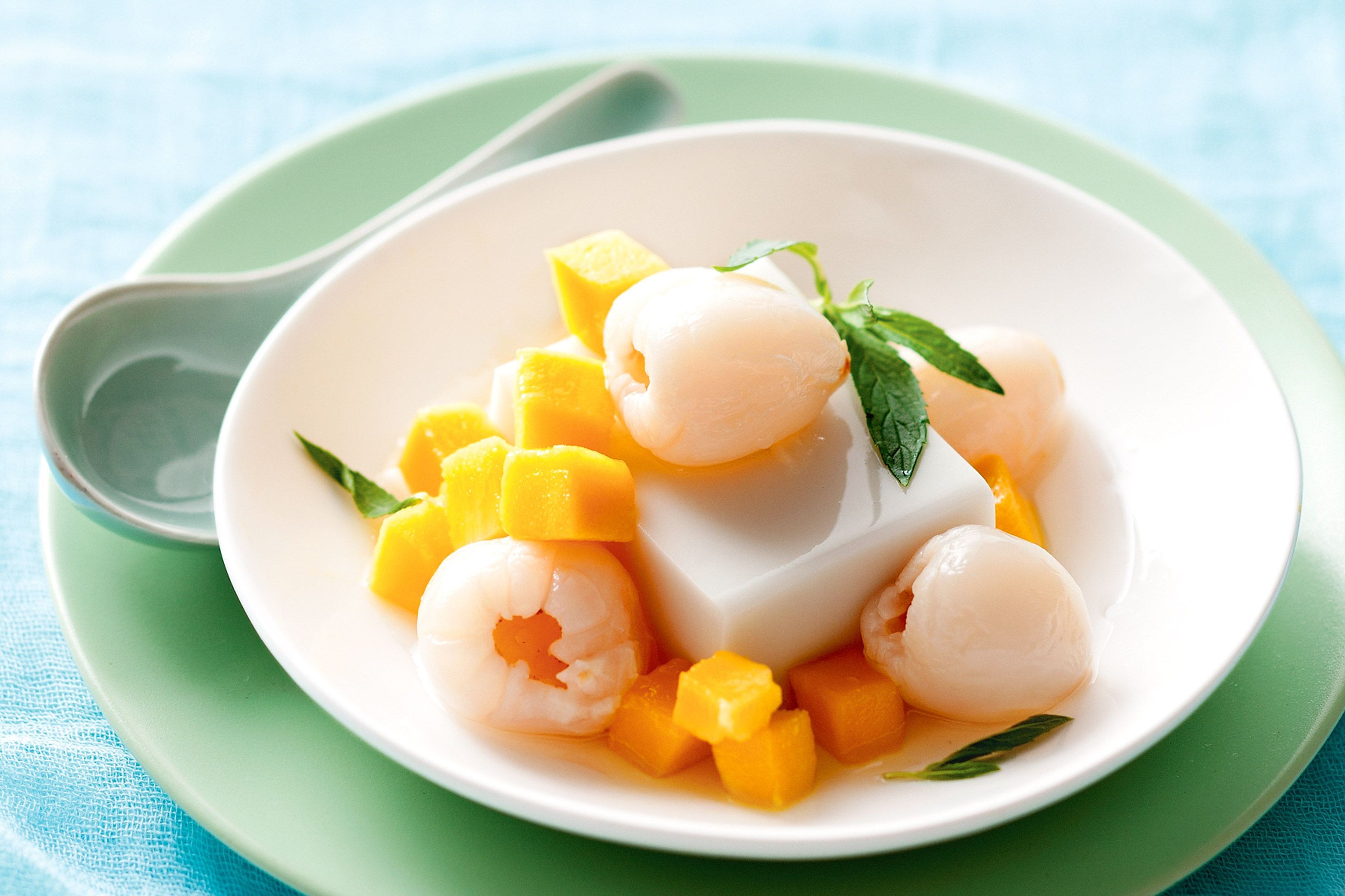 Coconut pudding with lychee and mango salad