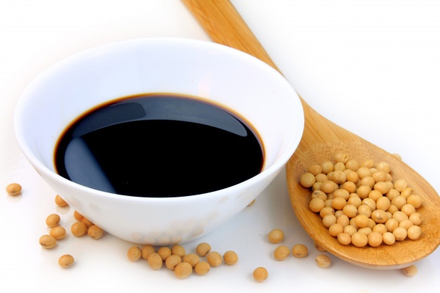 Premium Photo | Soya beans with dark soy sauce in a ceramic bowl isolated over white background