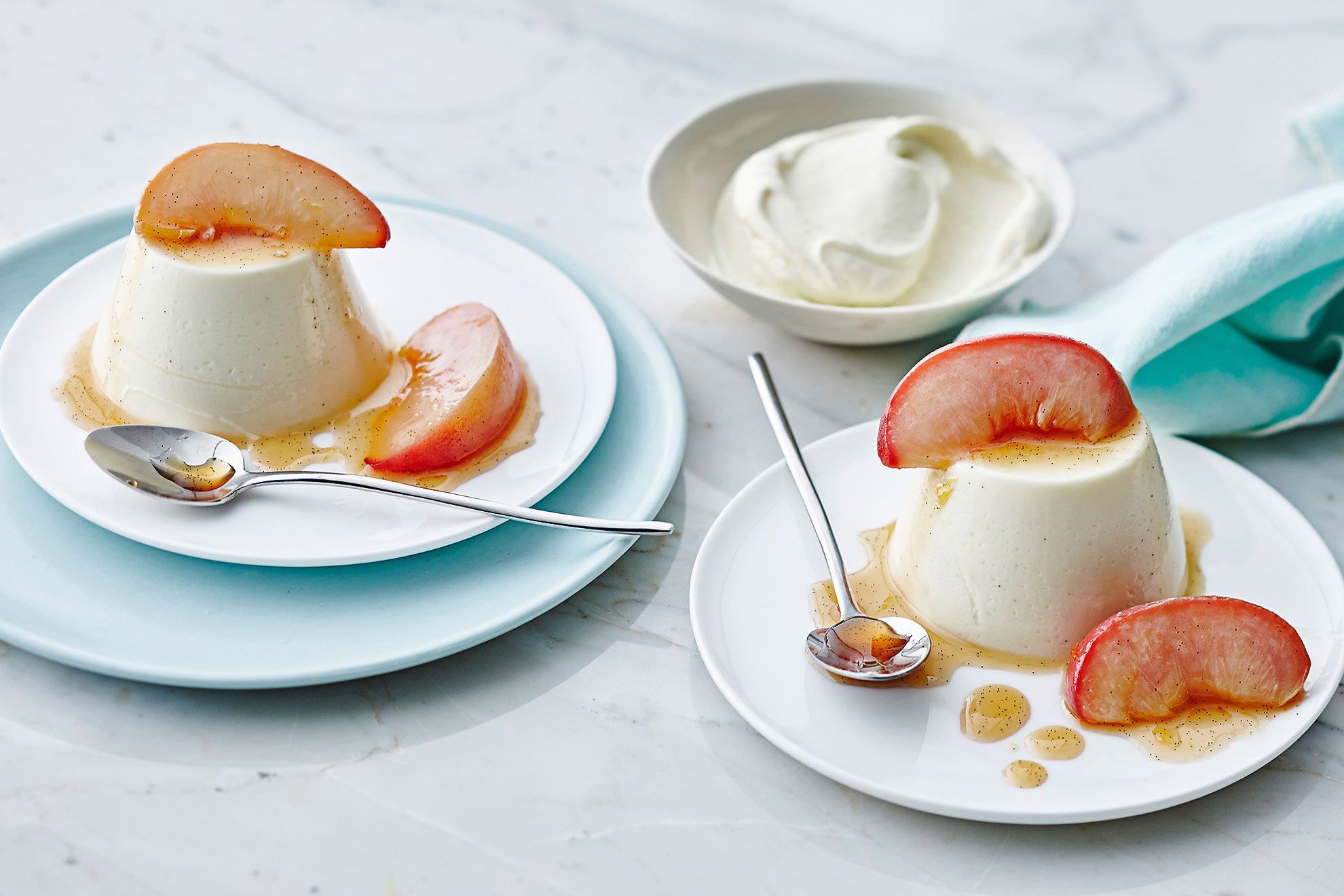 Vanilla and cardamom panna cotta with poached peaches